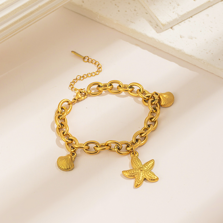 Brazalete Dorado con Dijes Marinos