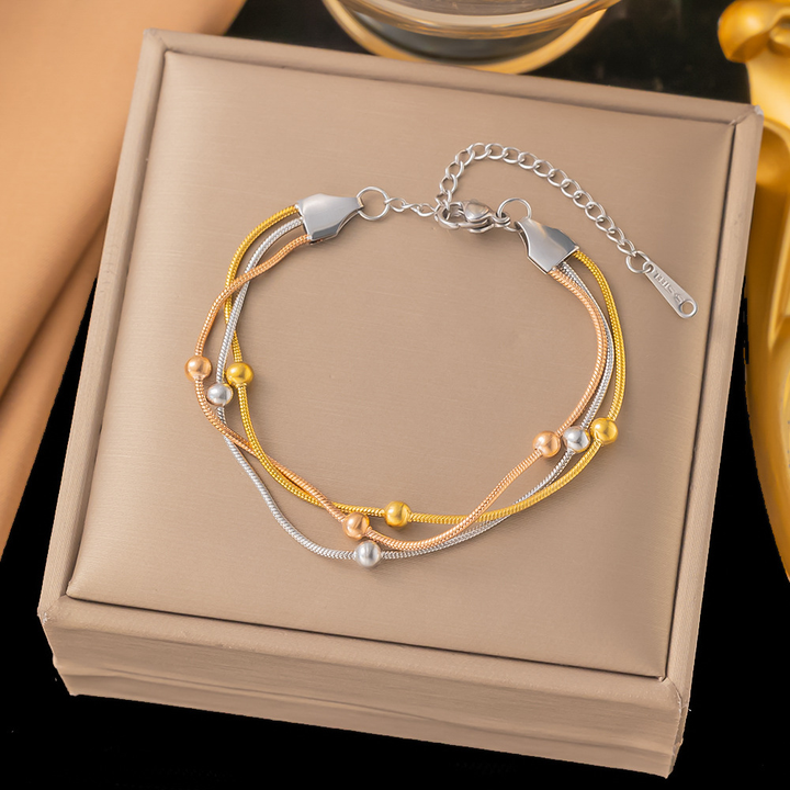 Brazalete Triple Cola de Raton Con Esferas Dorado, Plateado & Rosa