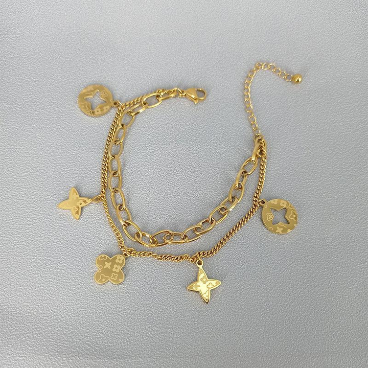 Brazalete Doble Flores Doradas
