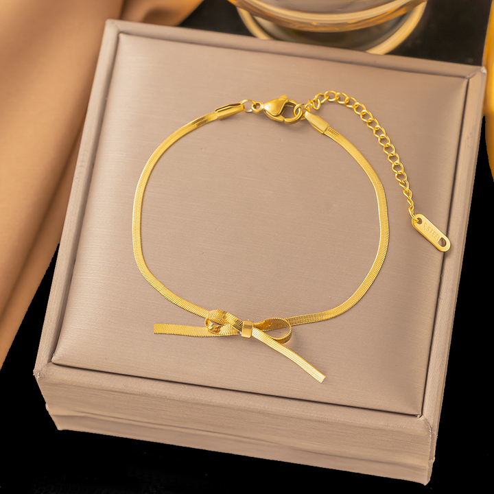 Brazalete Cadena de Serpiente Con Moño Dorado