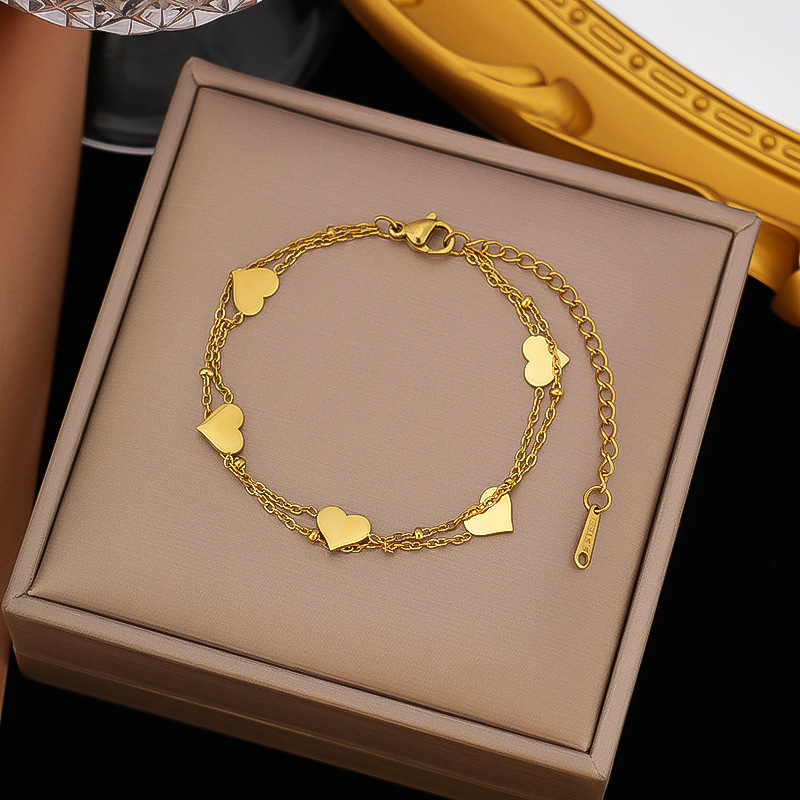 Brazalete Doble Cadena Corazones Dorados