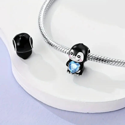 Pingüino y Corazón Azul