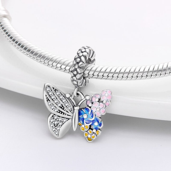 Mariposa con Flores
